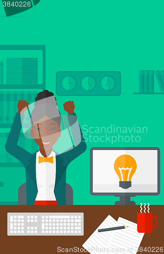 Image of Woman working at office.