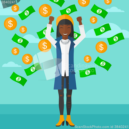 Image of Happy woman with  flying money. 