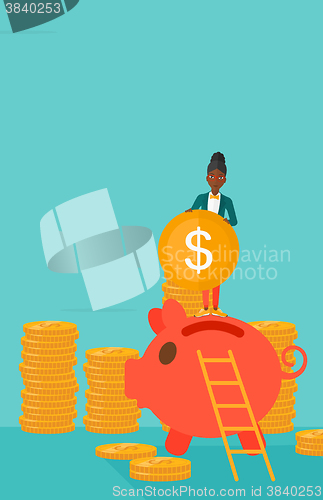 Image of Woman putting coin in piggy bank.