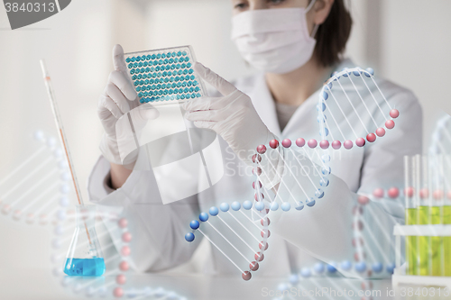 Image of close up of scientist making test in lab