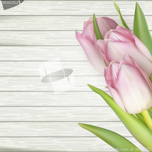 Image of Pink tulips over white wood table. EPS 10