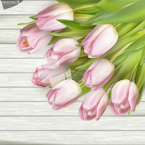 Image of Color tulips on wooden background. EPS 10