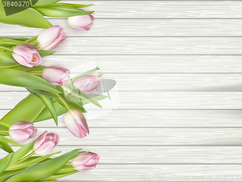 Image of Pink tulips over white wood table. EPS 10