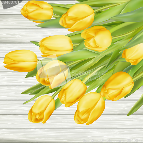 Image of Fresh yellow tulips on wooden background. EPS 10