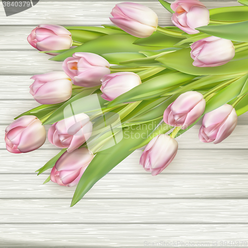 Image of Bouquet of tulips on a wooden background. EPS 10