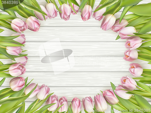 Image of Color tulips on wooden background. EPS 10