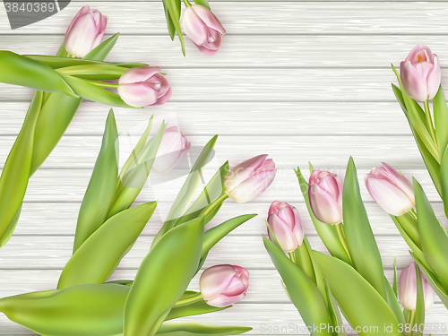 Image of Beautiful tulips on wooden table, closeup. EPS 10