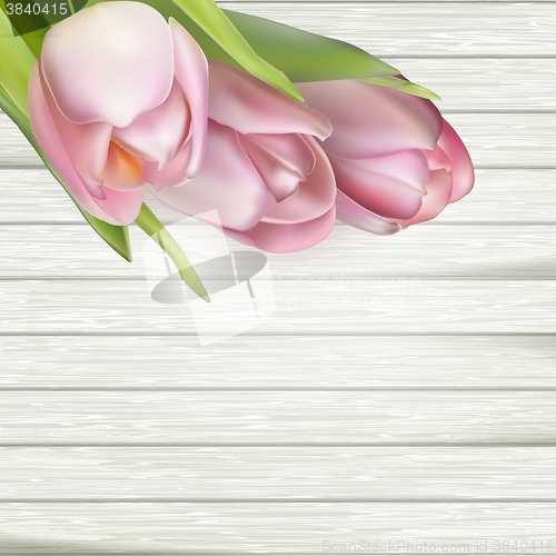 Image of Pink tulips over white wood table. EPS 10