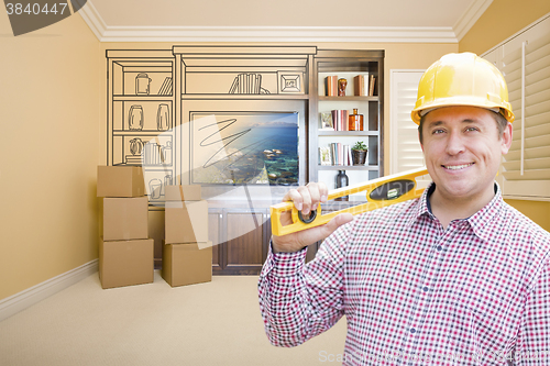 Image of Male Construction Worker In Room With Drawing of Entertainment U