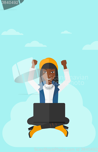 Image of Woman sitting on cloud with laptop.