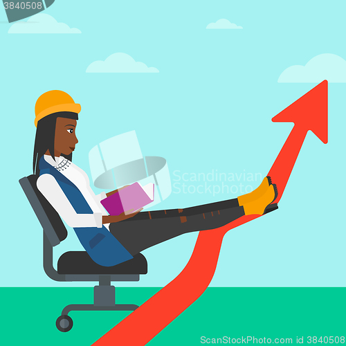 Image of Business woman reading book.