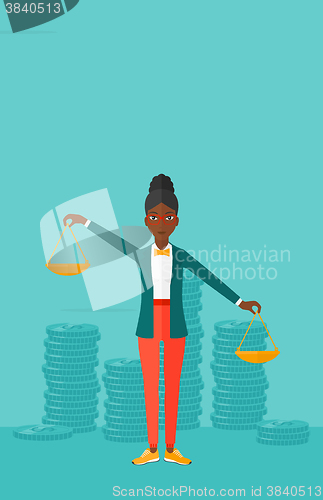 Image of Business woman with scales.