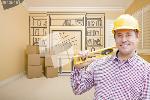 Image of Male Construction Worker In Room With Drawing of Entertainment U
