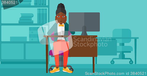 Image of Tired employee sitting in office.