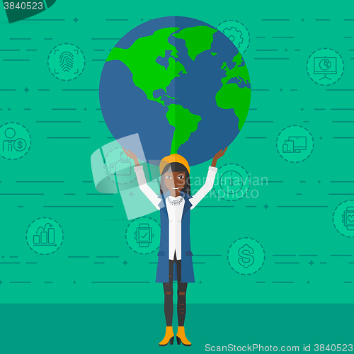 Image of Woman holding globe.
