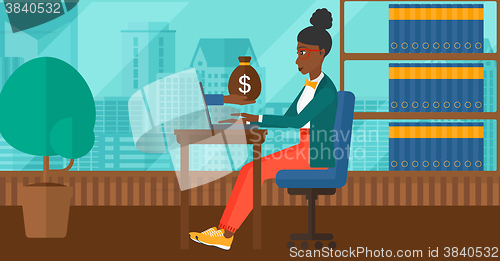 Image of Business woman working in office.