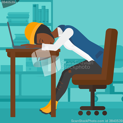 Image of Woman sleeping on workplace.