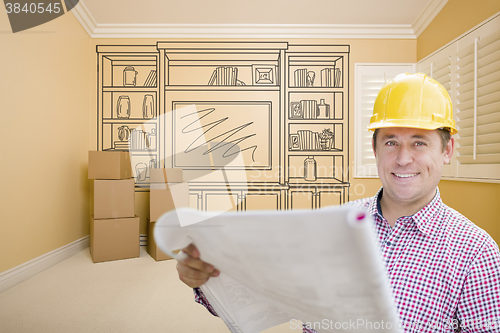 Image of Male Construction Worker In Room With Drawing of Entertainment U