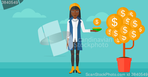 Image of Woman catching dollar coins.