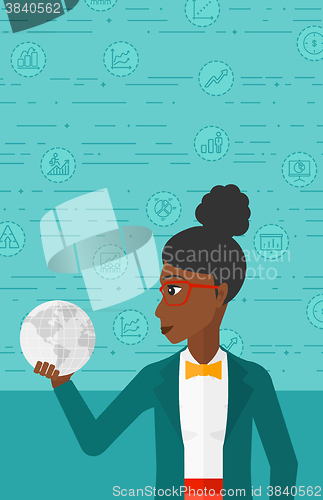 Image of Woman holding globe.