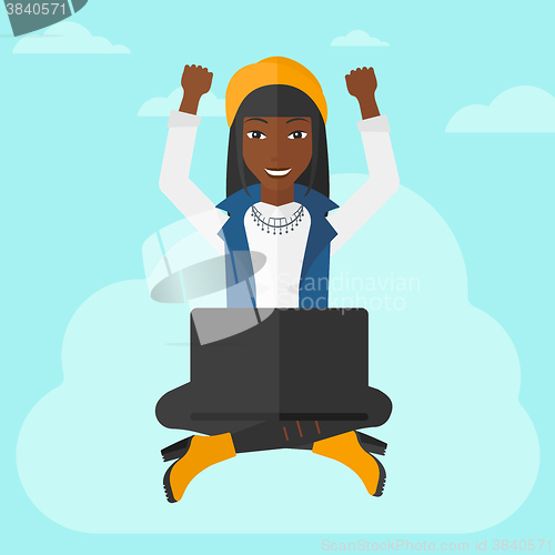 Image of Woman sitting on cloud with laptop.