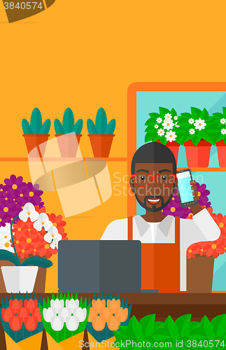 Image of Florist taking order.