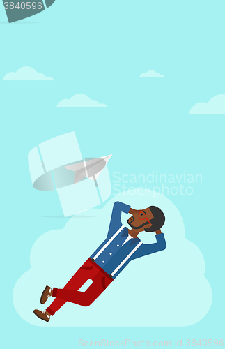 Image of Businessman relaxing on cloud.