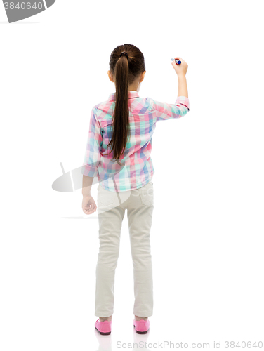 Image of little girl drawing or writing with marker