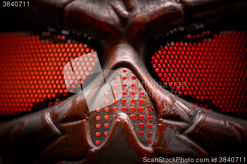 Image of Steel mask covered with rust closeup