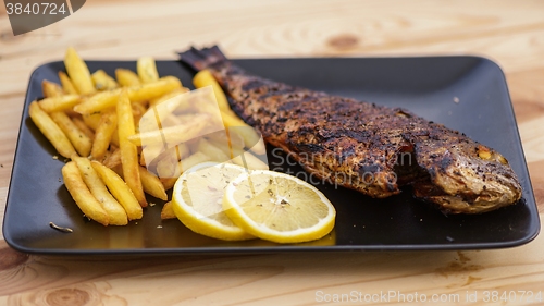 Image of Cooking fish on the grill