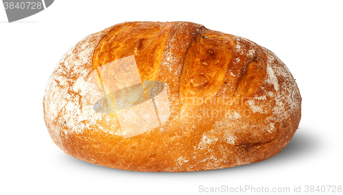 Image of In front loaf of white round bread