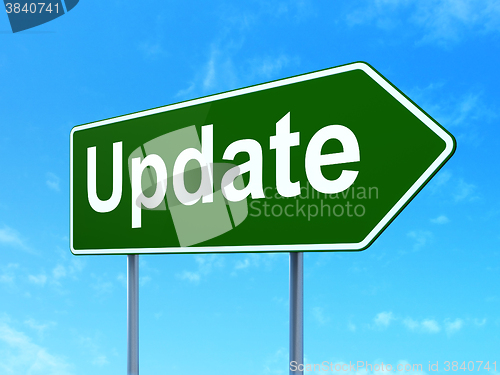 Image of Web development concept: Update on road sign background