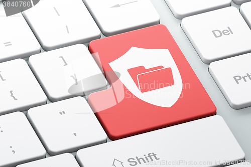 Image of Finance concept: Folder With Shield on computer keyboard background