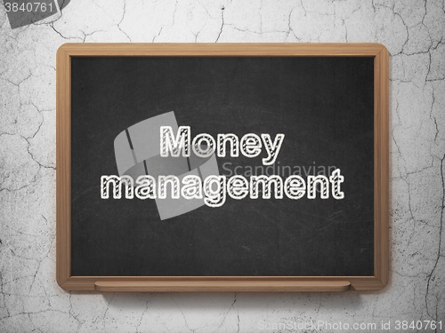 Image of Banking concept: Money Management on chalkboard background