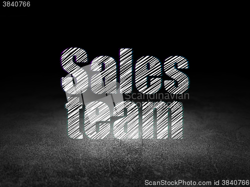 Image of Advertising concept: Sales Team in grunge dark room