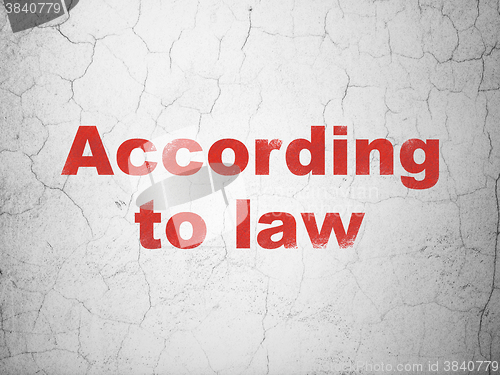 Image of Law concept: According To Law on wall background