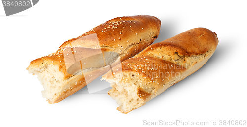 Image of Two pieces of French baguette beside