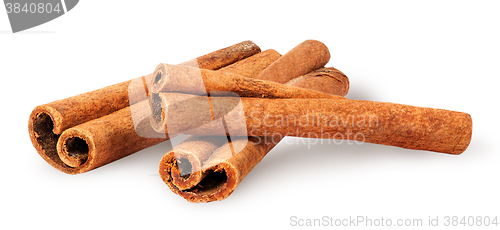 Image of Three cinnamon sticks lying cross