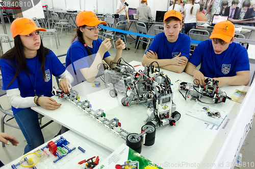 Image of students of college show electronic components