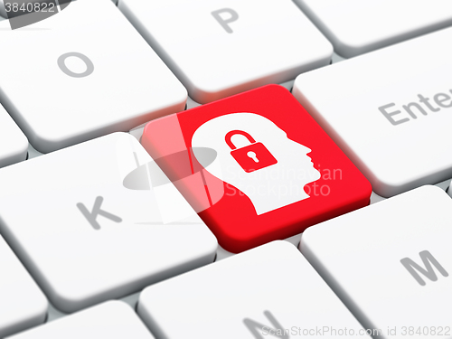 Image of Business concept: Head With Padlock on computer keyboard background