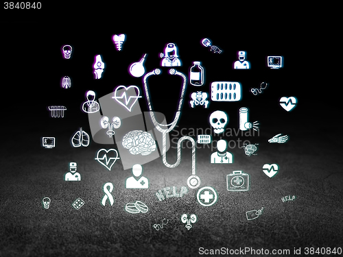 Image of Health concept: Stethoscope in grunge dark room