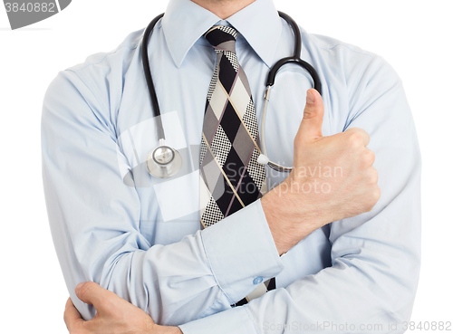 Image of Close up of male doctor hand showing thumbs up