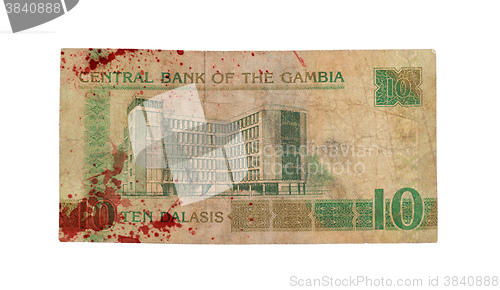 Image of 5 Gambian dalasi bank note, bloody