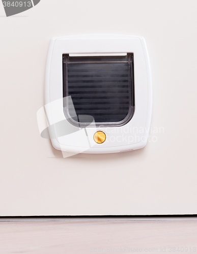 Image of Inside view of a regular white cat flap