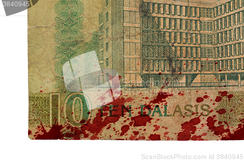 Image of 10 Gambian dalasi bank note, bloody