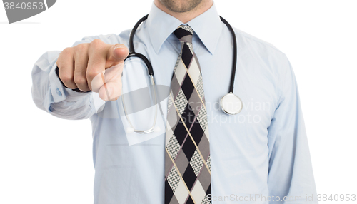 Image of Doctor pointing with his finger, closeup