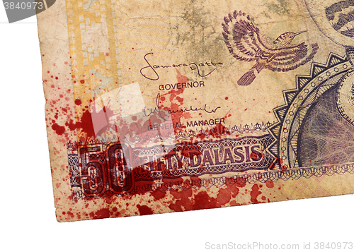 Image of 50 Gambian dalasi bank note, bloody