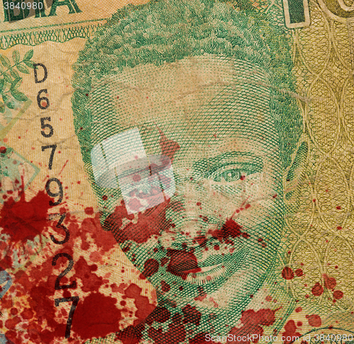 Image of 10 Gambian dalasi bank note, bloody