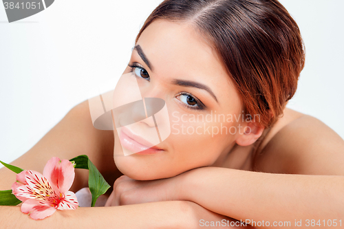 Image of Beautiful young woman at a spa salon
