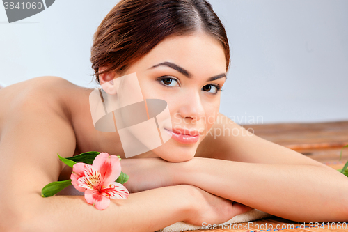 Image of Beautiful young woman at a spa salon